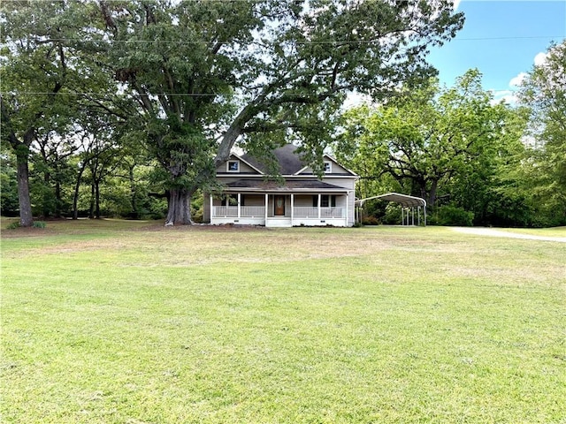 5192 Davis Cir, Anderson, SC 29625 - view of front facade featuring covered porch, a detached carport, and a front lawn