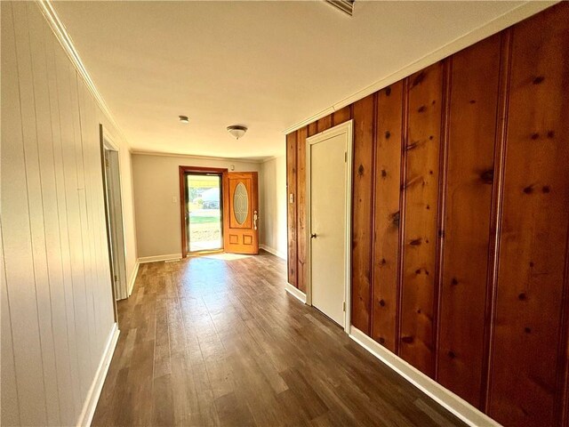 5192 Davis Cir, Anderson, SC 29625 - corridor featuring dark wood-type flooring, baseboards, ornamental molding, and wooden walls