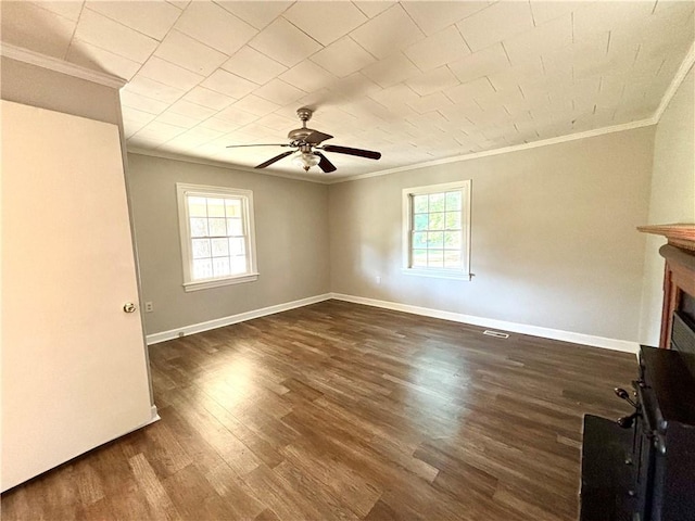 5192 Davis Cir, Anderson, SC 29625 - unfurnished living room with ornamental molding, a ceiling fan, dark wood-style flooring, a fireplace, and baseboards
