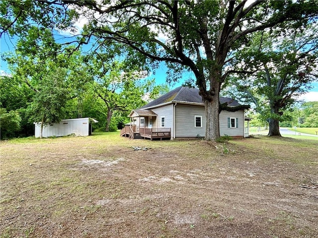 5192 Davis Cir, Anderson, SC 29625 - view of green lawn featuring a wooden deck and an outdoor structure