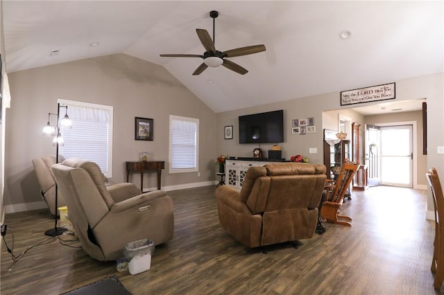 living area with lofted ceiling, dark wood-style flooring, baseboards, and ceiling fan
