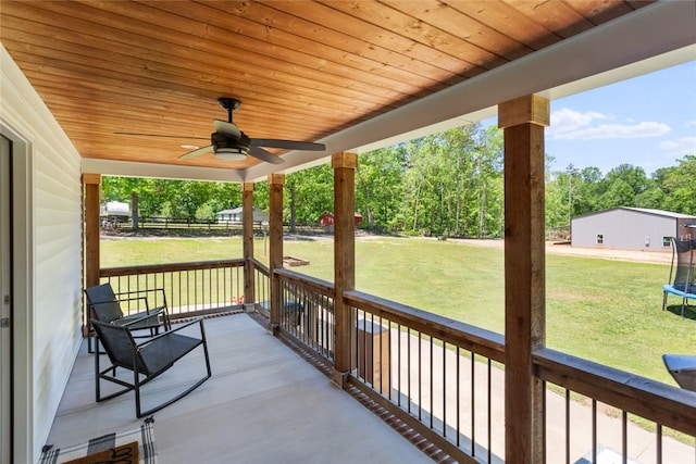 view of patio with a trampoline and ceiling fan