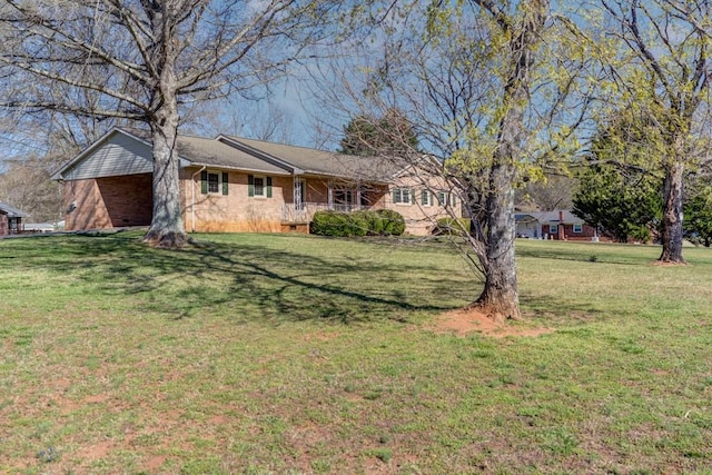 102 Norman St, Liberty, SC 29657 - view of front of house with a front lawn and brick siding