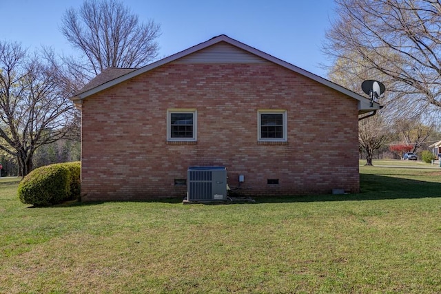 102 Norman St, Liberty, SC 29657 - view of side of property featuring central AC, a yard, brick siding, and crawl space