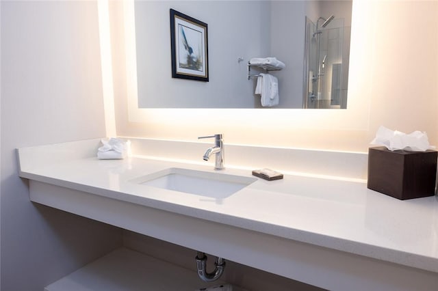 full bath with walk in shower and vanity