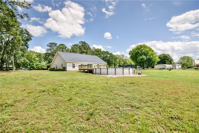 103 Mar Mac Rd, Anderson, SC 29626 - view of grassy yard with an outdoor pool and a deck
