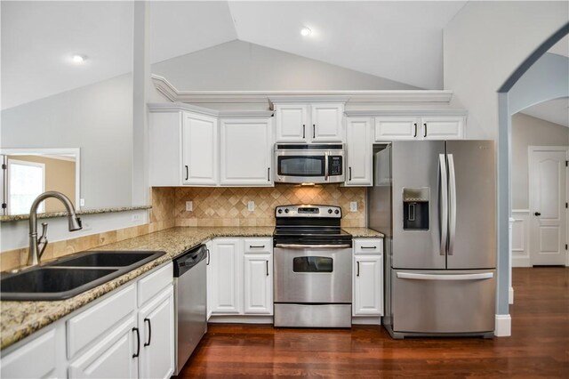 103 Mar Mac Rd, Anderson, SC 29626 - kitchen featuring a sink, lofted ceiling, white cabinets, and appliances with stainless steel finishes