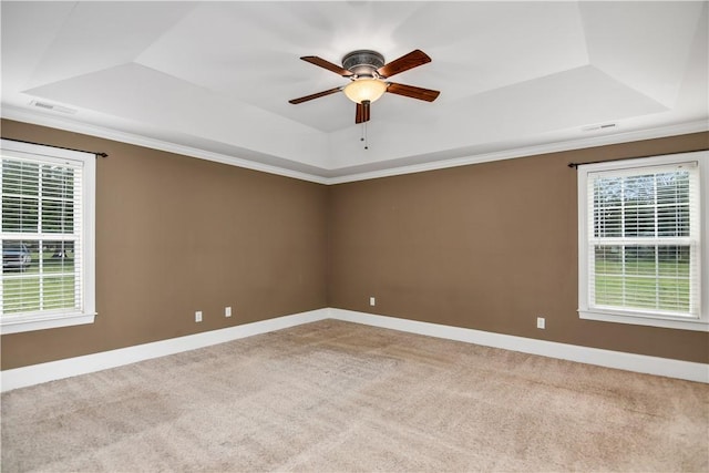 103 Mar Mac Rd, Anderson, SC 29626 - empty room with a tray ceiling, carpet flooring, plenty of natural light, and ceiling fan