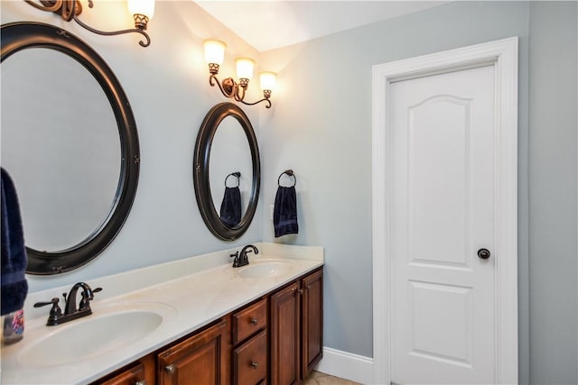 103 Mar Mac Rd, Anderson, SC 29626 - bathroom featuring baseboards, double vanity, and a sink