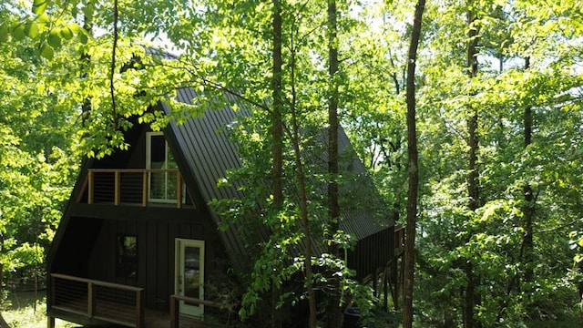 90 Eagle Claw Ct, Martin, GA 30557 - view of property exterior with board and batten siding and metal roof