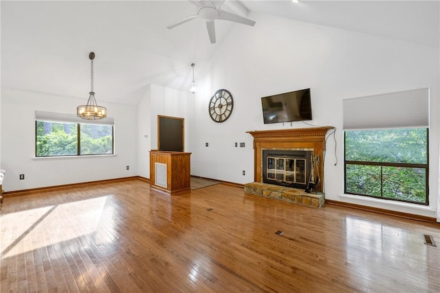 110 Safe Harbor Cir, Salem, SC 29676 - unfurnished living room with high vaulted ceiling, a fireplace, wood finished floors, a ceiling fan, and baseboards