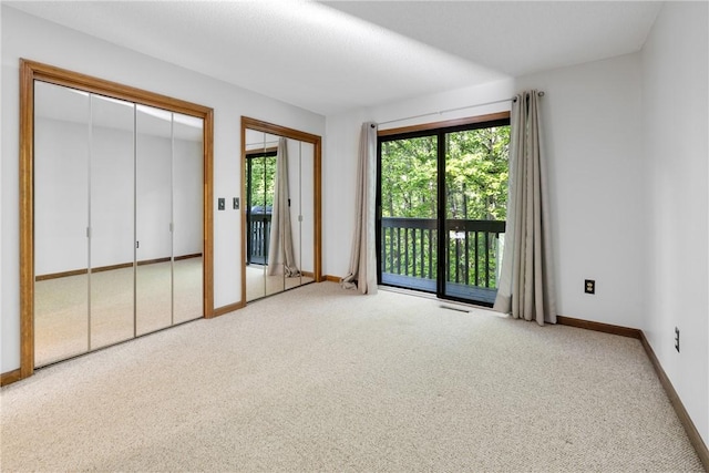 110 Safe Harbor Cir, Salem, SC 29676 - unfurnished bedroom with carpet flooring, access to outside, multiple closets, and baseboards