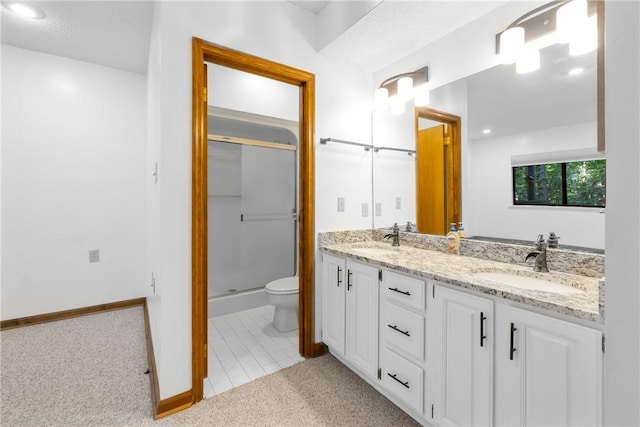 110 Safe Harbor Cir, Salem, SC 29676 - bathroom with a shower stall, double vanity, toilet, baseboards, and tile patterned floors