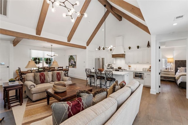 113 Settlement Village Dr, Sunset, SC 29685 - living area featuring a chandelier, beam ceiling, wood finished floors, high vaulted ceiling, and recessed lighting