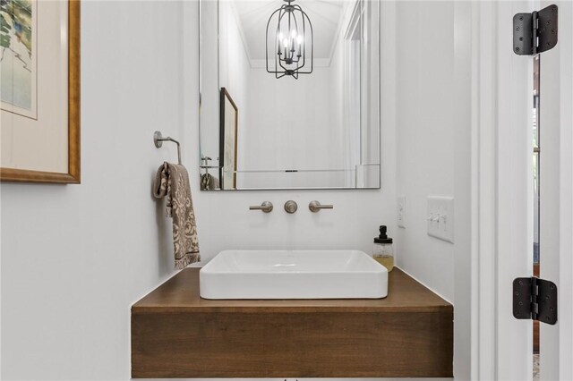 113 Settlement Village Dr, Sunset, SC 29685 - bathroom with a sink and a chandelier