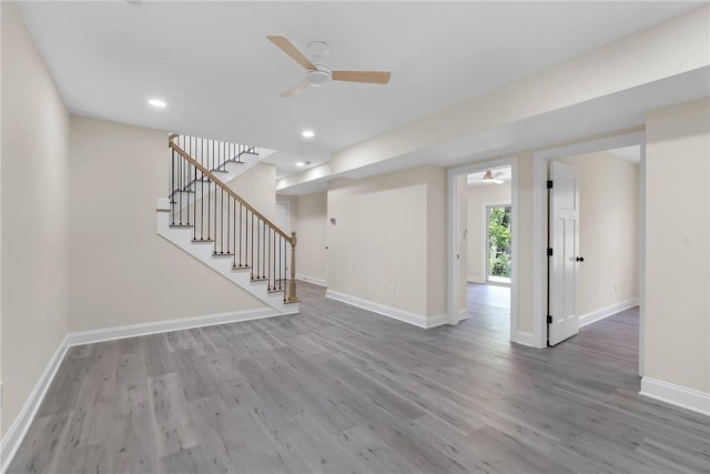 3062 Woodale Cir, Seneca, SC 29678 - unfurnished living room with ceiling fan, baseboards, wood finished floors, stairs, and recessed lighting