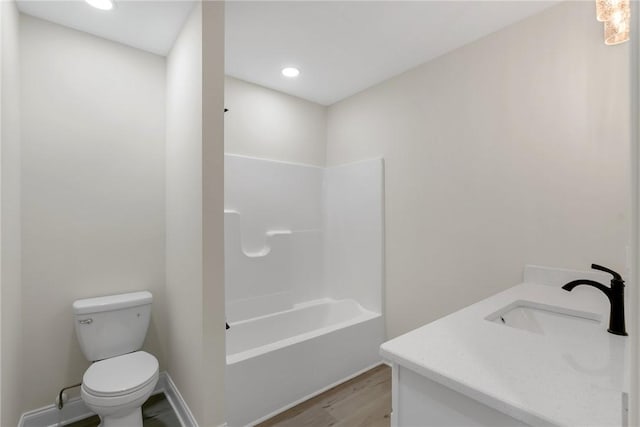 3062 Woodale Cir, Seneca, SC 29678 - bathroom with wood finished floors, toilet, recessed lighting, vanity, and bathtub / shower combination