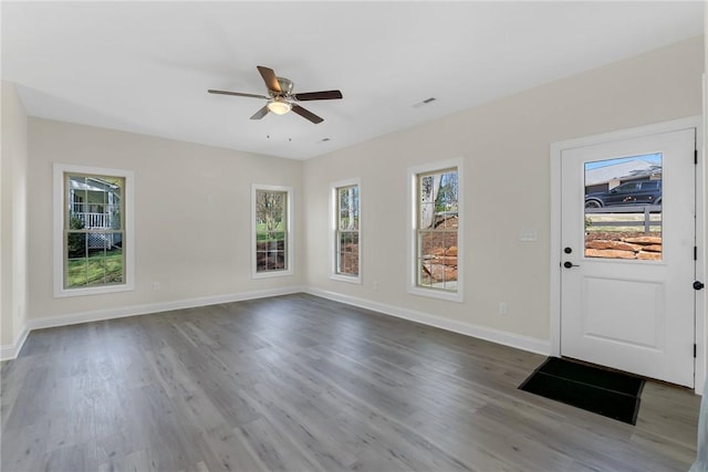 3062 Woodale Cir, Seneca, SC 29678 - foyer with healthy amount of natural light, a ceiling fan, and baseboards