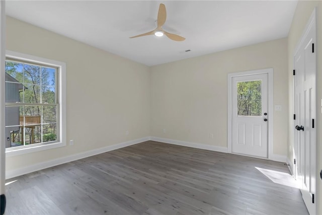 3062 Woodale Cir, Seneca, SC 29678 - empty room with plenty of natural light and wood finished floors