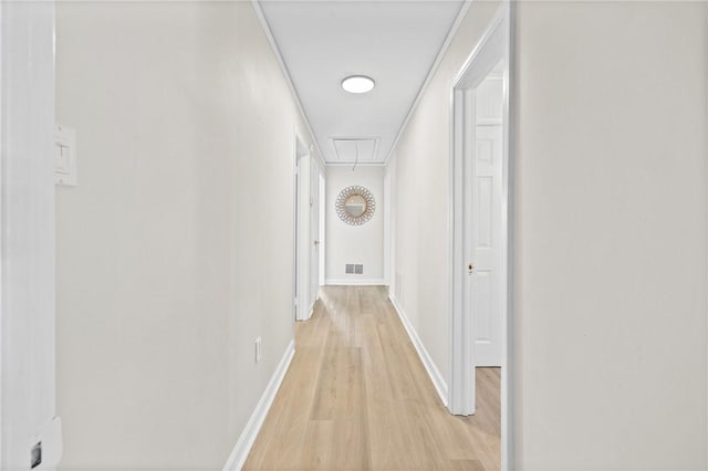 1102 Garrison Rd, Anderson, SC 29625 - hall with attic access, light wood finished floors, and baseboards