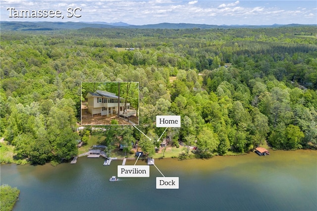 619 Crossland Creek Ct, Tamassee, SC 29686 - aerial overview of property's location featuring a heavily wooded area, a large body of water, and property parcel outlined