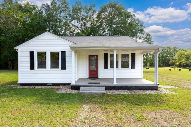 bungalow-style home with a porch and a front lawn