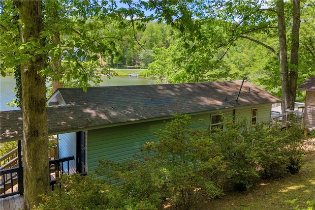 621 Crossland Creek Ct, Tamassee, SC 29686 - view of property exterior featuring a shingled roof and a water view