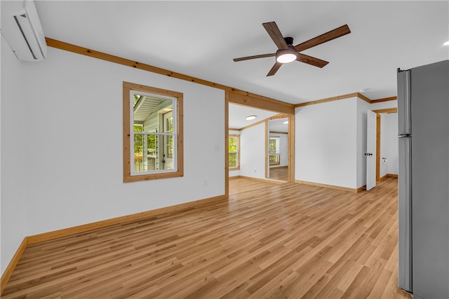 621 Crossland Creek Ct, Tamassee, SC 29686 - spare room with an AC wall unit, ceiling fan, light wood-type flooring, baseboards, and recessed lighting