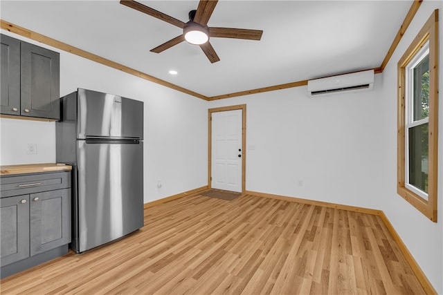 621 Crossland Creek Ct, Tamassee, SC 29686 - unfurnished living room with a wall mounted air conditioner, light wood finished floors, baseboards, a ceiling fan, and recessed lighting