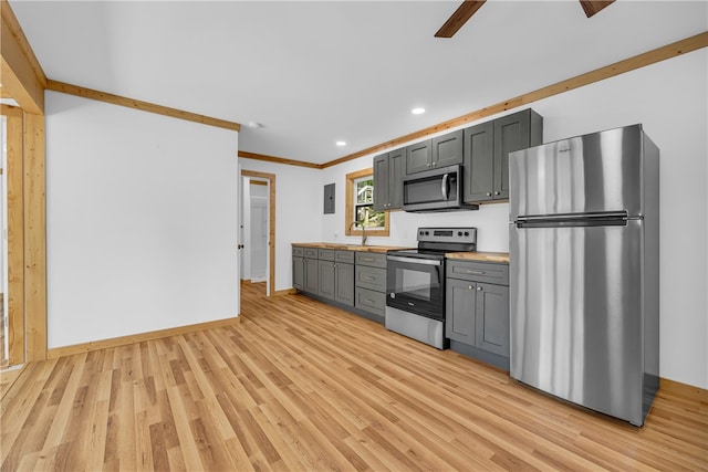 621 Crossland Creek Ct, Tamassee, SC 29686 - kitchen featuring stainless steel appliances, gray cabinetry, light wood-style floors, baseboards, and ornamental molding