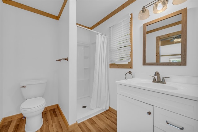 621 Crossland Creek Ct, Tamassee, SC 29686 - bathroom featuring wood finished floors, toilet, vanity, baseboards, and a shower stall