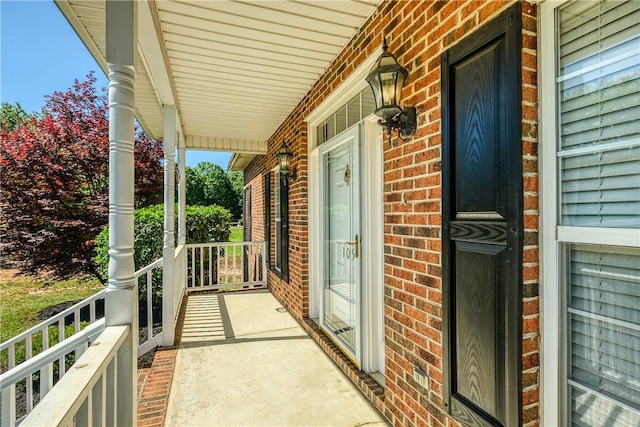 balcony featuring a porch