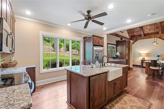 109 Laurel Pond Way, Sunset, SC 29685 - kitchen featuring a sink, appliances with stainless steel finishes, wood finished floors, ceiling fan, and baseboards
