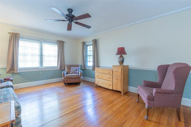 605 Boulevard, Anderson, SC 29621 - living area featuring light wood finished floors, ceiling fan, ornamental molding, and baseboards