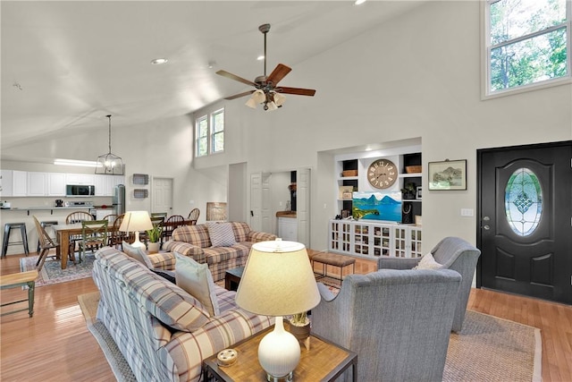 451 Cedar Creek Rd, Sunset, SC 29685 - living room with high vaulted ceiling, a ceiling fan, light wood-type flooring, and recessed lighting