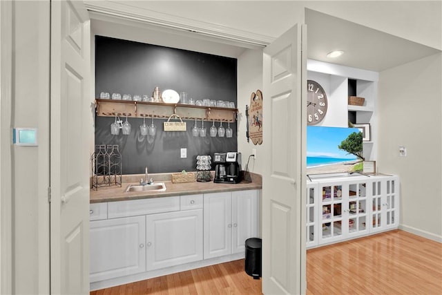451 Cedar Creek Rd, Sunset, SC 29685 - indoor wet bar featuring light wood-type flooring and baseboards