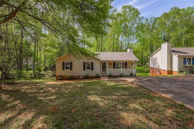 1012 Kens Pl, Taylors, SC 29687 - ranch-style house featuring covered porch, a front yard, crawl space, and driveway