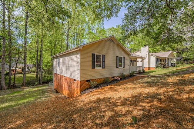1012 Kens Pl, Taylors, SC 29687 - view of side of home with crawl space and a yard