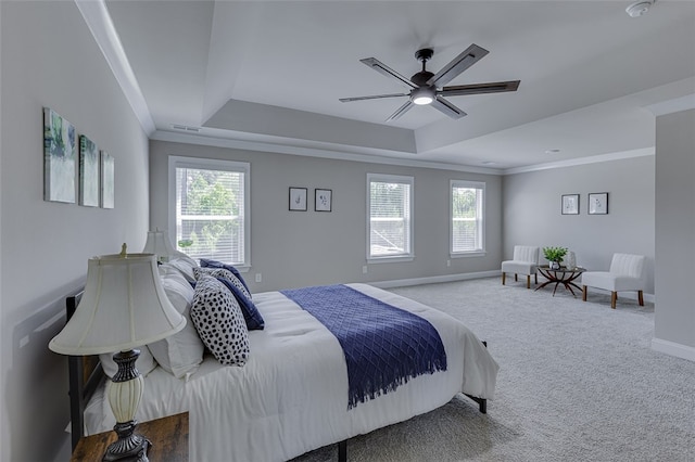 709 Whitemarsh Ave, Simpsonville, SC 29680 - carpeted bedroom featuring baseboards, crown molding, a tray ceiling, and a ceiling fan