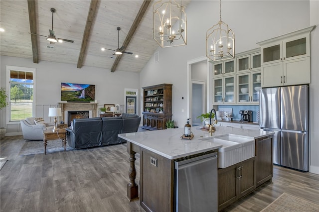 130 Paulan Rd, Williamston, SC 29697 - kitchen featuring appliances with stainless steel finishes, a sink, high vaulted ceiling, dark wood-type flooring, and open floor plan