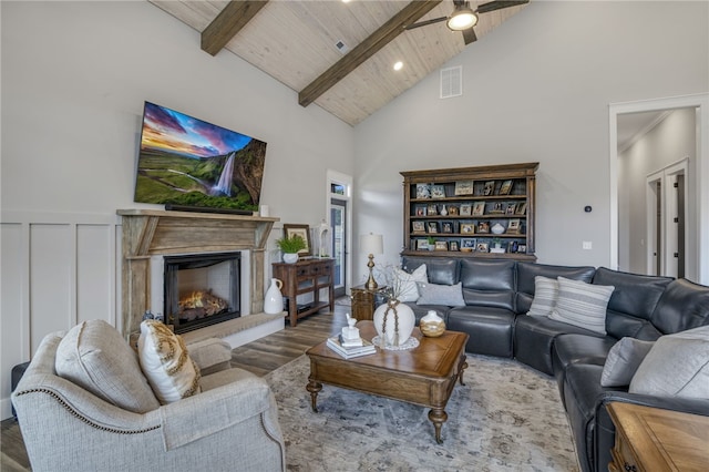 130 Paulan Rd, Williamston, SC 29697 - living area featuring wood ceiling, wood finished floors, high vaulted ceiling, beam ceiling, and a glass covered fireplace
