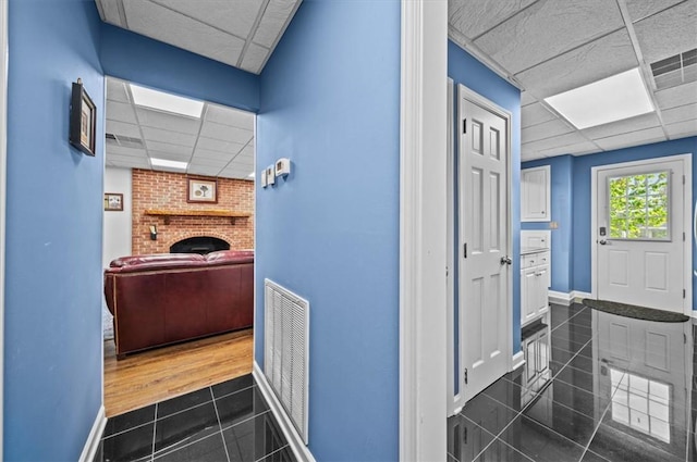 224 Sheffield Rd, Greer, SC 29651 - corridor with a drop ceiling, baseboards, and dark tile patterned flooring