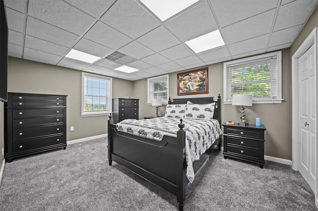 224 Sheffield Rd, Greer, SC 29651 - bedroom featuring carpet, baseboards, a drop ceiling, and multiple windows