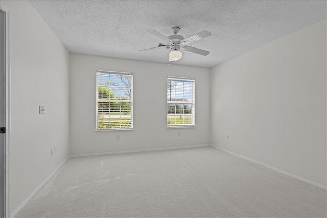 105 Tripmont Ct, Simpsonville, SC 29680 - carpeted empty room with a textured ceiling, baseboards, and ceiling fan
