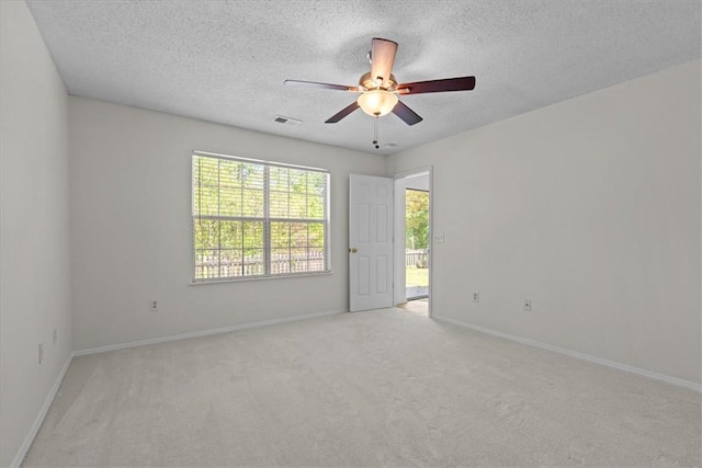 105 Tripmont Ct, Simpsonville, SC 29680 - unfurnished room with ceiling fan, light carpet, baseboards, and a textured ceiling