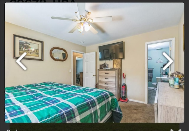 carpeted bedroom with baseboards, ceiling fan, and ensuite bath