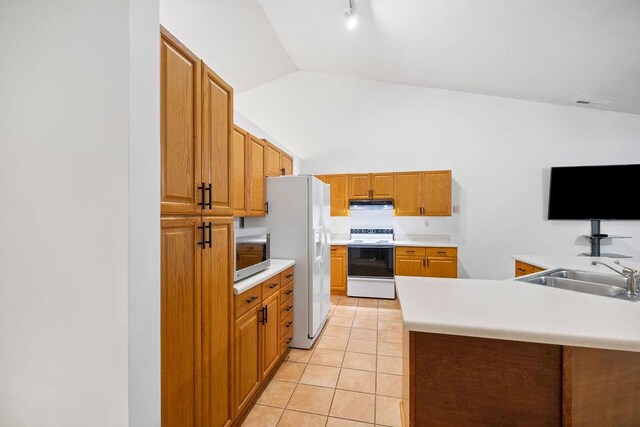 111 Coachman Ct, Anderson, SC 29625 - kitchen featuring white appliances, a sink, vaulted ceiling, light tile patterned floors, and light countertops