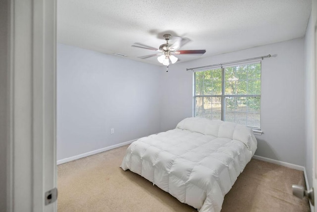 111 Coachman Ct, Anderson, SC 29625 - bedroom with carpet, baseboards, a textured ceiling, and a ceiling fan