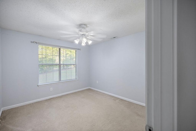 111 Coachman Ct, Anderson, SC 29625 - carpeted empty room with a textured ceiling, baseboards, and a ceiling fan