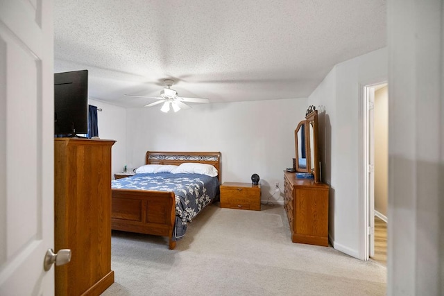 111 Coachman Ct, Anderson, SC 29625 - carpeted bedroom featuring a ceiling fan, a textured ceiling, and baseboards
